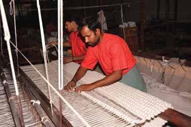 the sun, but now huge ovens provide constant drying temperatures all year round 15 Handwoven rugs receive a