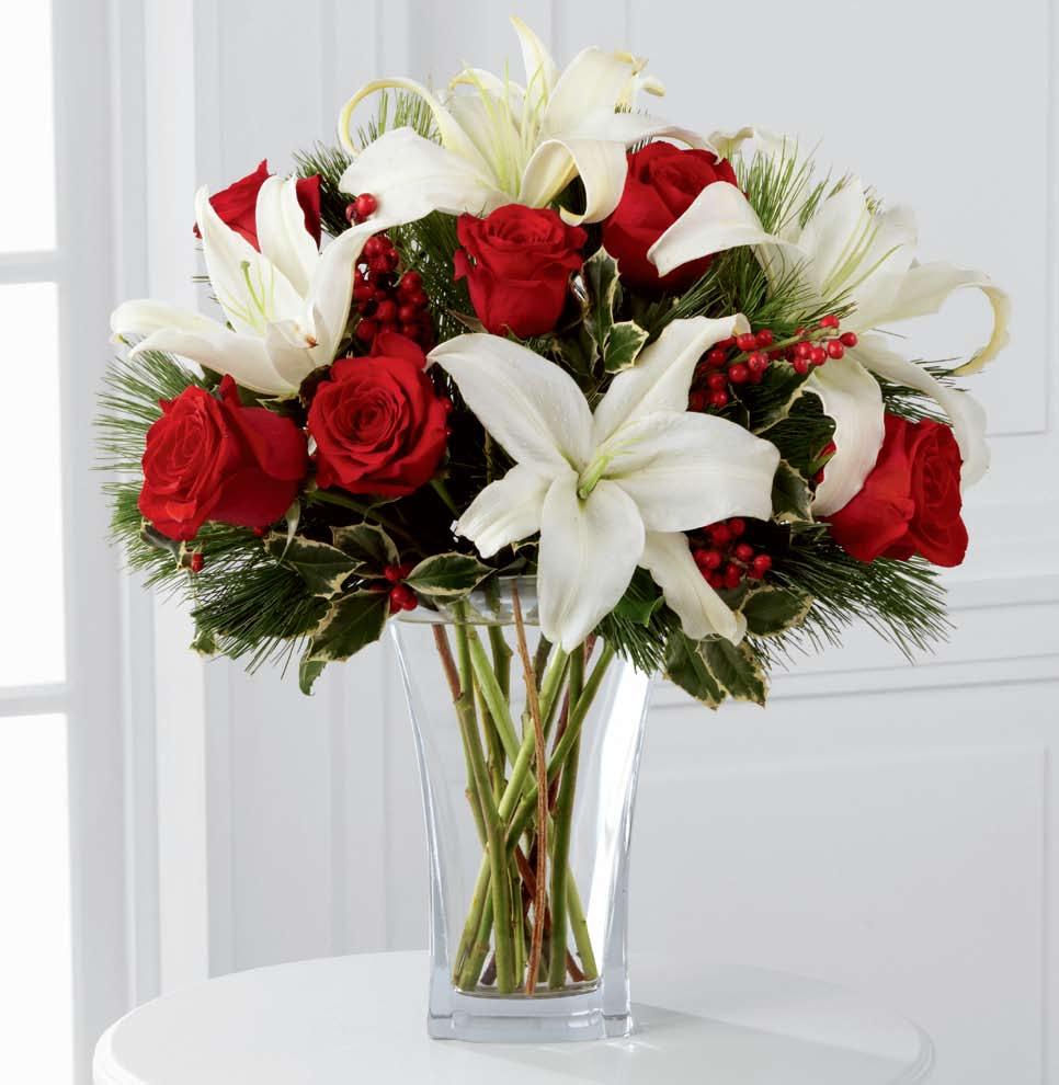 c h r i s t m a s i s s at u r day, d e c e m b e r 5 t h bright wishes The FTD holiday wishes Bouquet C8 A clear, sculpted glass vase is the ideal vessel for this stunning arrangement starring white