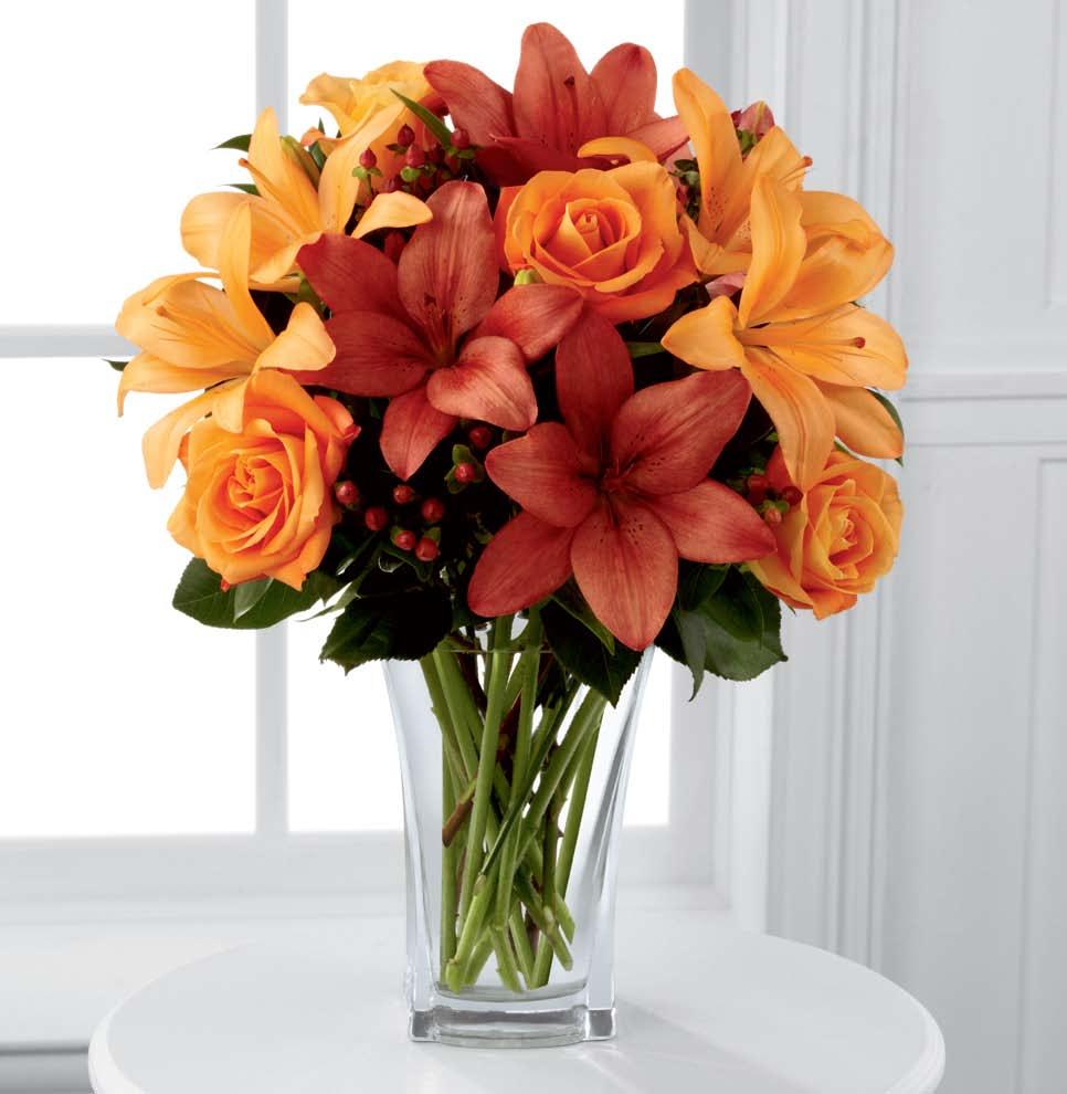 thanksgiving is thursday, november 5th autumn fire The FTD giving thanks Bouquet F4 Fiery-hued flowers, including orange roses and both rust and orange Asiatic lilies, dazzle the eye in a clear