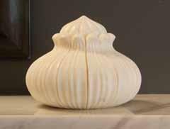 urn is carved by hand by highly skilled