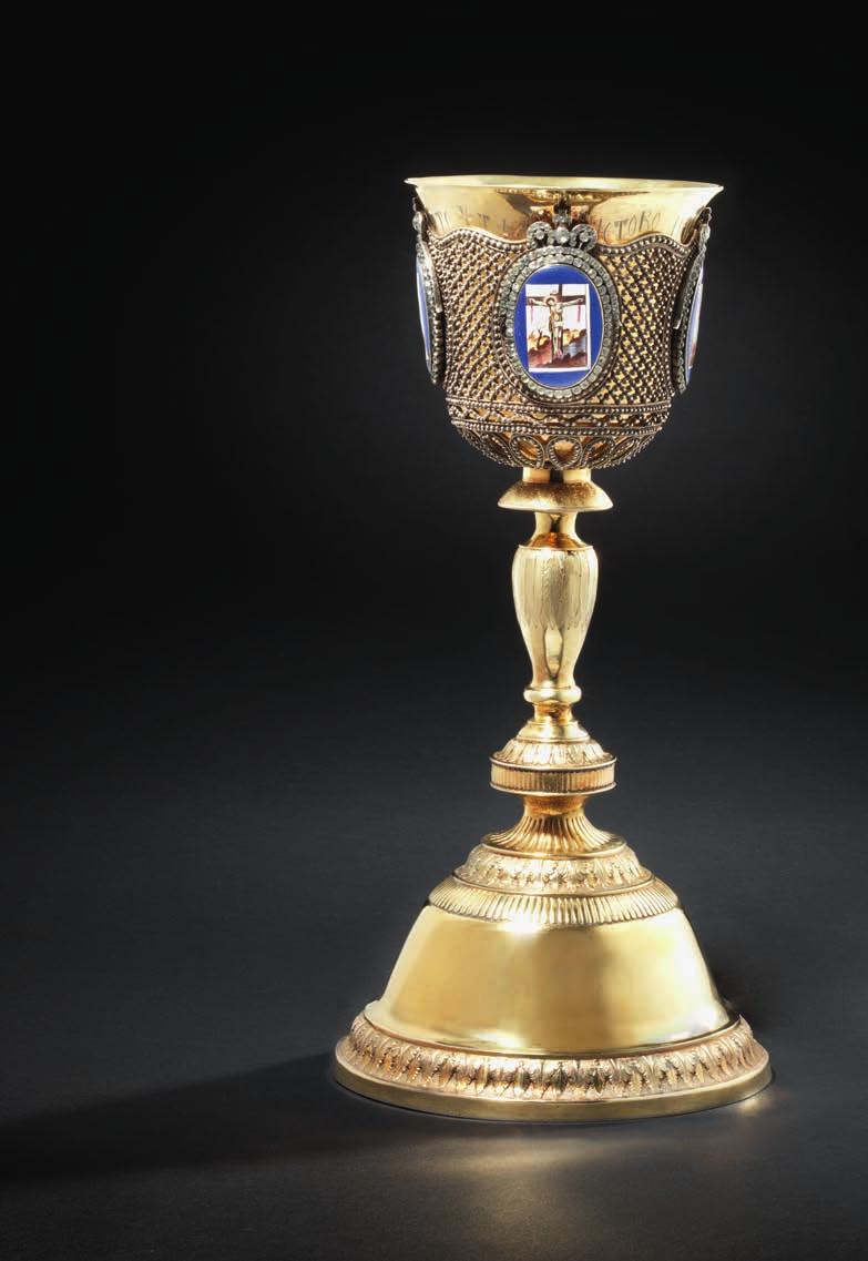 772 RUSSIAN SILVERSMITH, EARLY 19TH CENTURY A large Russian silver-gilt chalise, cup with silver gratings, engraved with a sentence from the Russian-Ortodox Holy Sacrement, below four mitre crowned