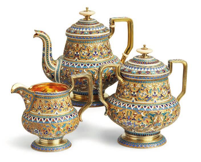 825 825 IVAN SALTYKOV, MOSCOW 1894 A Russian silver-gilt and cloisonné enamel tête-atête tea service, comprising teapot with a lid, sugarbowl with a lid and a creamer, with coloured stylized flowers