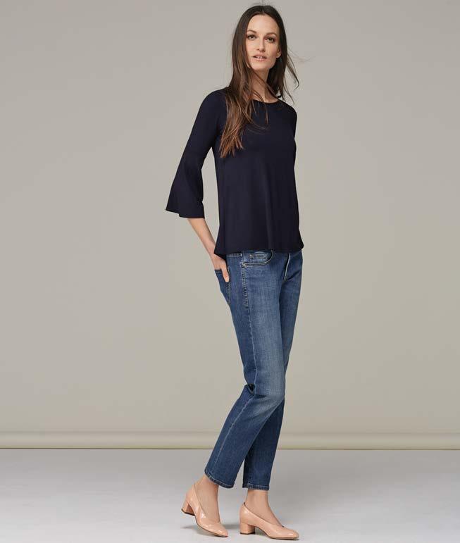 Your modern chic top with a subtle flared sleeve.