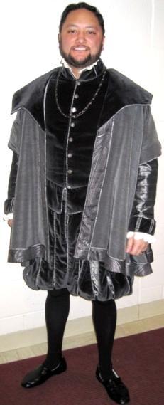 COURT White t-shirt Charcoal velvet doublet w/grey and black striped taffeta sleeves and offwhite neck and cuff ruffles Charcoal velvet-paned pumpkin