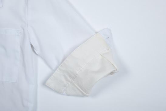 From button stand to cuff, the garment is lined