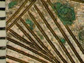 The rectangular rather than triangular shape of the strokes making the lines suggests that the tool was held less obliquely, at times almost vertically.