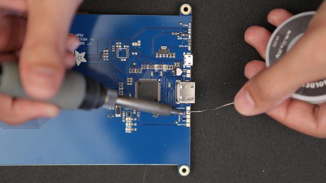 Tin and solder monitor pads Apply a small amount