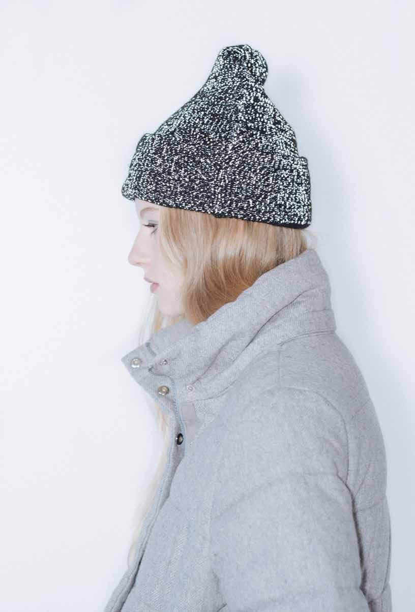 1001 ABBOTT Infused with speckled yarn detailing throughout, the classic flat knit Reflective Abbott beanie features an elevated profile and a broad cuff with a distinctive rendition of Herschel