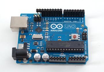 Place the header onto your Arduino, if you have an R2 or earlier arduino, there will be two pins that 'hang over' past the AREF