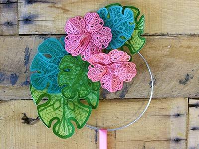 Create a jungle wreath by combining the organza leaf with a lace hibiscus from our sister company Urban Threads.