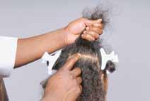 Apply the relaxer with an applicator brush, or the back of the comb, or your fingers.