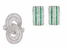 343 White Gold, Emerald and Diamond Ring 18 kt., one oval emerald ap. 4.10 cts., 89 round diamonds ap. 1.25 cts., ap. 7 dwts. Size 7. 344 Platinum and Diamond Star harm Bracelet, Tiffany & o.