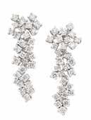 , round diamonds ap. 2.30 cts. Length 16 1/2 inches. 114 Pair of White Gold and Diamond Earrings 18 kt., 58 round diamonds ap. 2.60 cts., ap. 5.9 dwts.