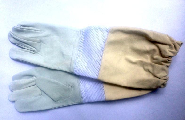 VENTILATED BEEKEEPING GLOVES Heavy Stitching At Seams. Soft but rugged goatskin leather. Long heavy canvas upper glove to protect your arms.