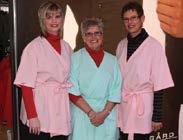 com/5/46 Women having breast screening done wearing our