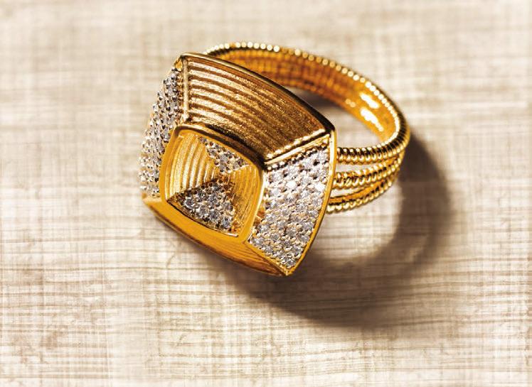 Gold studded richly with white diamonds capture the mystery surrounding