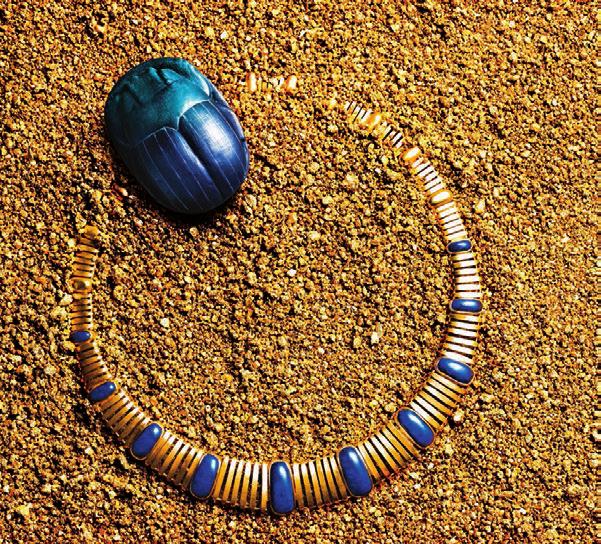 1174NAI Lines of gold are punctuated by lapis lazuli, a stone meant to bring happiness