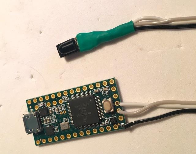 If you've uploaded the React code to the Teensy already, you can test the sensor by plugging in a USB cable and pressing some buttons on your remote.