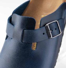 the original 1 1 The Boston clog has a strap with buckle for individual