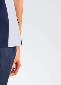 Short sleeves. Plain navy back. Side slits. Length 77 cm.