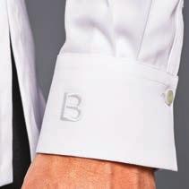 Buttons concealed under placket. Stitched fold detail on both sides of button placket and back yoke.