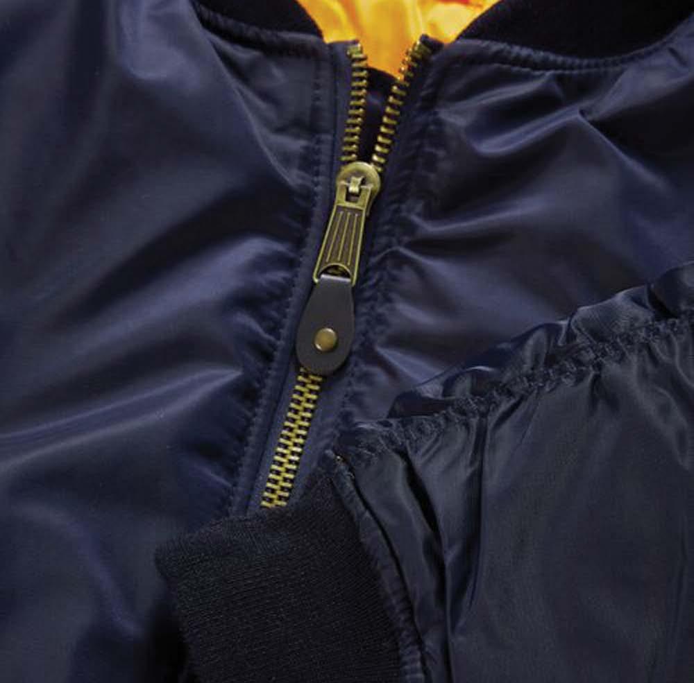 Zipped sleeve pocket Ribbed cuffs and waistband Shell 100% nylon Orange