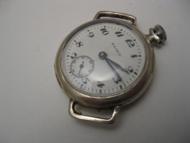 THE LOCK DOWN FLIP SPRING IS HEAVILY CARVED KANJI HERE WE HAVE A SILVER SEIKO 1920'S, FRESH FACT AS WAS.