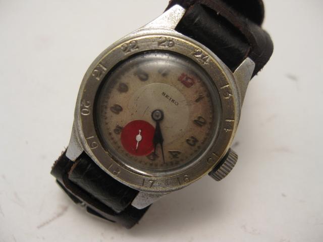 THE OUTER CASE HAD A 24HR MILITARY BEZEL.