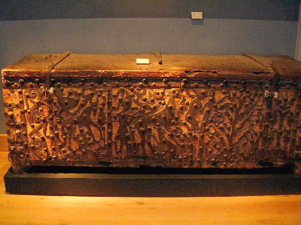 Church chests were usually ironbound and were used to store money or other valuables. The iron rings were decorative, and also might have helped anchor chains around the chest. (Plath, p.