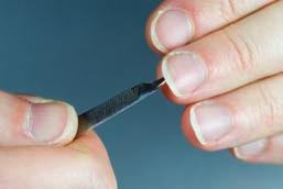 An emery board should not be used to scrape the natural nail surface at all as it will make smooth fingernails rough.