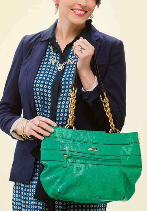1. DENA - DEMI Bright kelly green faux lizard features a roomy front zippered pocket and piecing along the top, with contrasting black-painted edges.