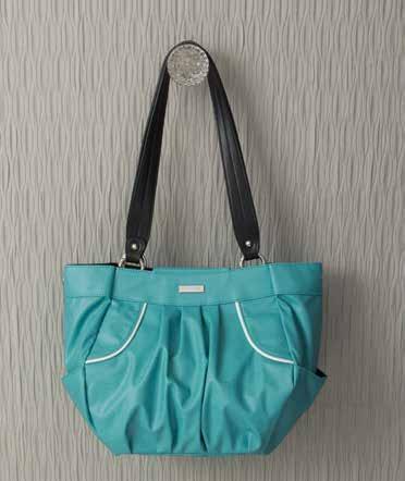1. 2. 1. KRIS - DEMI Turquoise faux leather with jaunty white trim. Side pockets. 3115 2.
