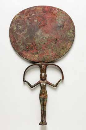 Nubian Collection D. 15831 87. MIRROR Copper alloy Egypt, Qustul, Tomb V 48 Excavated under the direction of Keith Seele, 1963 1964 New Kingdom, Dynasty 18, reign of Amunhotep III, ca.