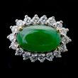 $1,100 $1,500 Jade, Diamond, 14k Yellow Gold Ring. Centering one oval jadeite cabochon measuring approximately 10.67 x 8.25 x 2.