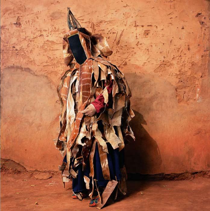 Abora Traditional Masquerade, Cross River, Nigeria The intimidating air of this costume is purely intentional: the skull headdress, carved from wood, is meant to frighten the gathered crowd with