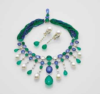 7 million, and finally an emerald diamond necklace dominated by a 39.70 ct centre stone from Colombia, accompanied by five smaller Colombian emeralds (SSEF 84906), which sold for US$ 2.