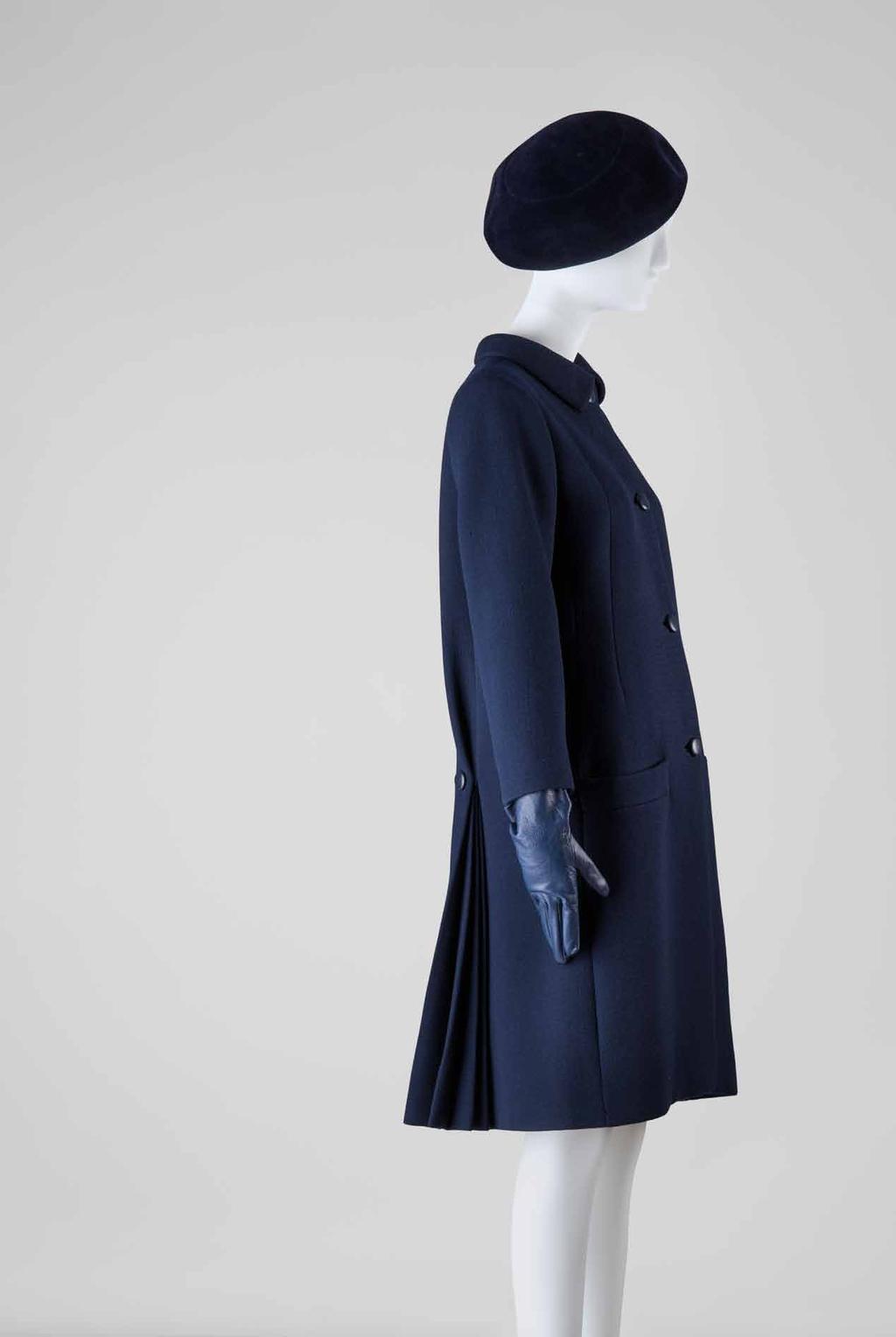 Mrs. Mellon and her World Navy blue wool serge coat with a panel of four pleats at the back. balenciaga. paris. August 1937. cbm 2004.37 Mrs.