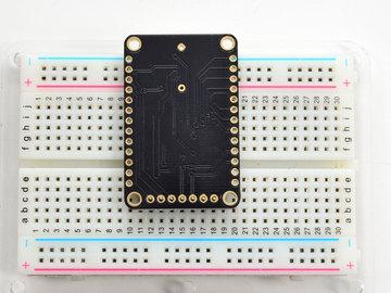 Add the breakout board: Place the breakout board over the pins so