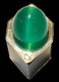 Marcelo Ribeiro of The stone, described as having a Belmont Mine holds mesmerising colour and impeccable clarity, up a 49.58-carat cat seye emerald.