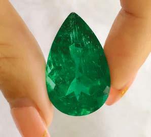 A model dons a set of Colombian emeralds emerald jewellery continue to be the most sought-after stones but we are seeing a lot of Chinese buyers becoming more interested in high-quality Zambian