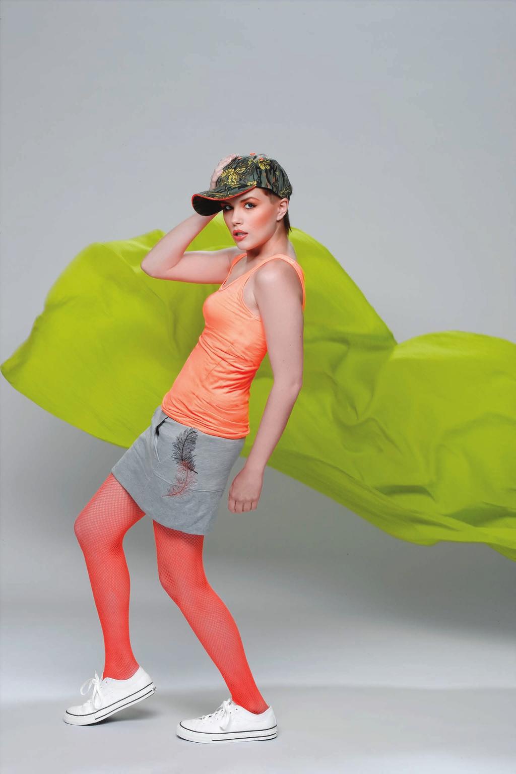 neon delight Zesty neon orange has left its earthy sisters in the dust, as it saucily pops on the edge of a trendy camo hat, brightens a sheer tank, goes metallic in ostrichfeather-inspired