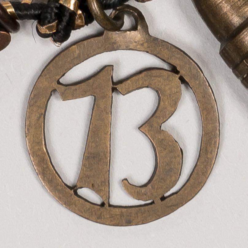 17. Circular pendant with number thirteen Numerology plays a large role in Jewish mysticism and symbolism. Thirteen is a good number, embracing ideas of love and oneness.