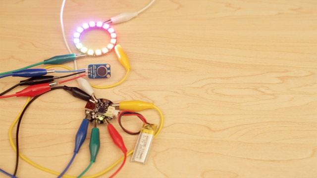 If the prototype is too flakey, try soldering jumper wires to the pins of the NeoPixel ring and the mic sensor and then alligator clipping them to the Gemma.