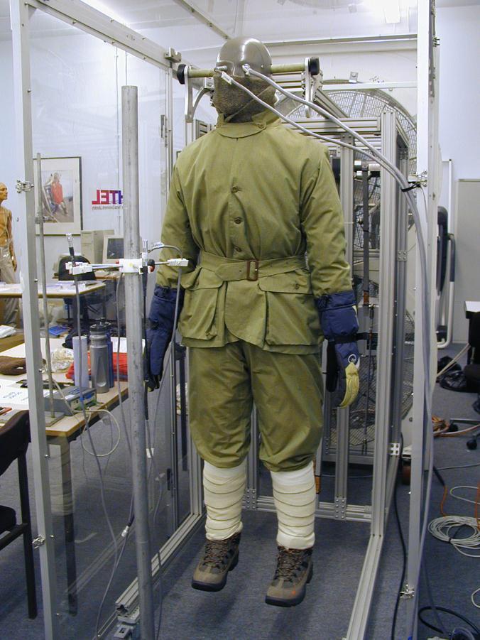 Fig. 3, The clothing of Mallory tested on the thermal manikin (left) and right, an original picture taken during the expedition (Royal Society). insulation values will be expressed in clo (1 clo=.