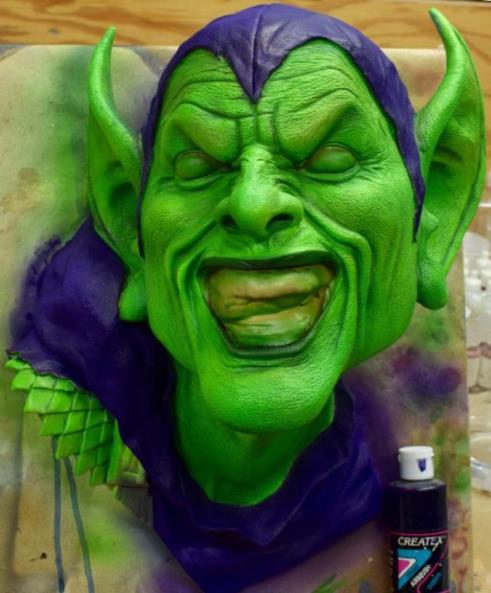 The challenge in painting such a large area of green and purple is to avoid making it look too uniform and solid. It is more visually appealing and realistic if you break up the monotone look.