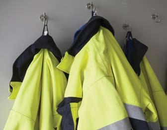To enhance the visibility of a wearer during the day, garments are made from fluorescent materials of standard colours.