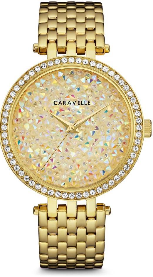 44L235 Bulova Caravelle Ladies Watch. Shine bright with 60 individually hand-set crystals. Stainless steel gold-tone case and bracelet. Gold crystal dial. Fold-over buckle closure.