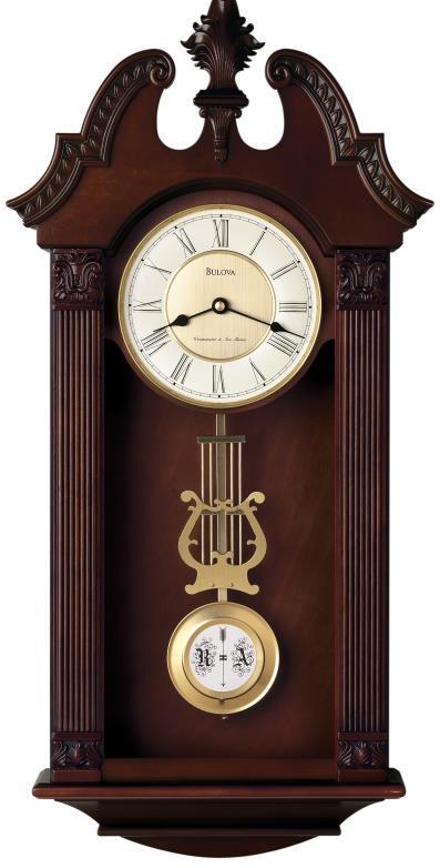 25 inch W: 11.25 inch D: 4.75 inch C4437 Bulova Clock. RIDGEDALE. Solid wood case, walnut finish. Decorative carved accents.