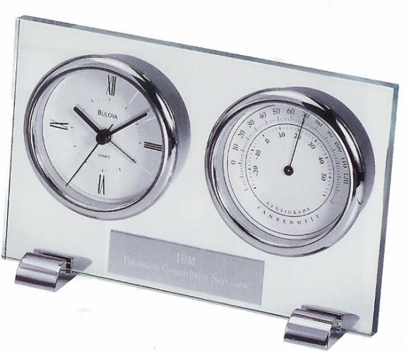Engraved Clocks Your personal message or logo can be engraved on solid brass plates on a variety of award clocks. B2880 Bulova CAMBERLEY Clock. Mineral glass case, chrome metal supports.