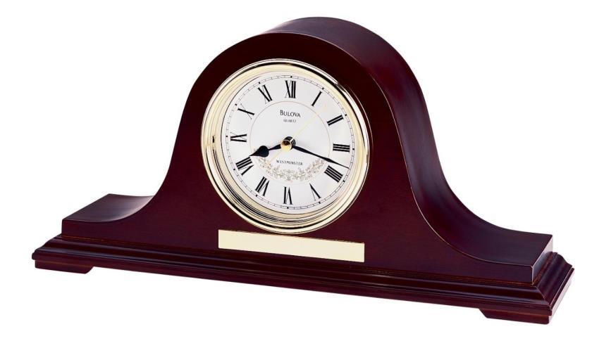 75 inch B7756 WILLITS TABLE CLOCK. From the Frank Lloyd Wright Collection inch Solid wood base and frame, light cherry finish.